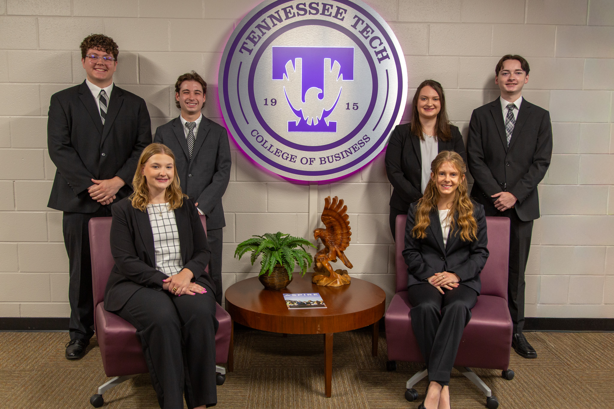 PRL 2026-2027 Team Professional Readiness and Leadership Team sitting in front of the Tennessee Tech College of Business Seal in professional attire