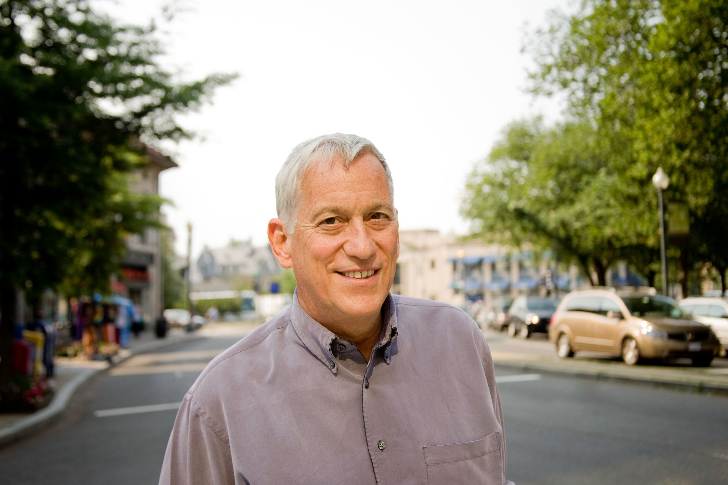 Walter Isaacson standing outside