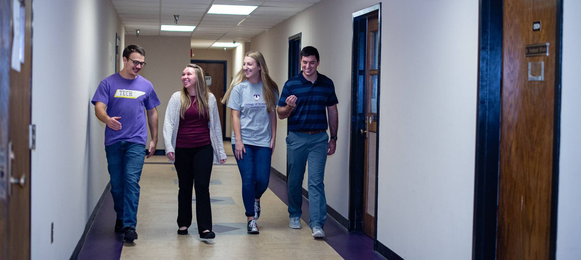 Students walking down a hall in Johnson Hall