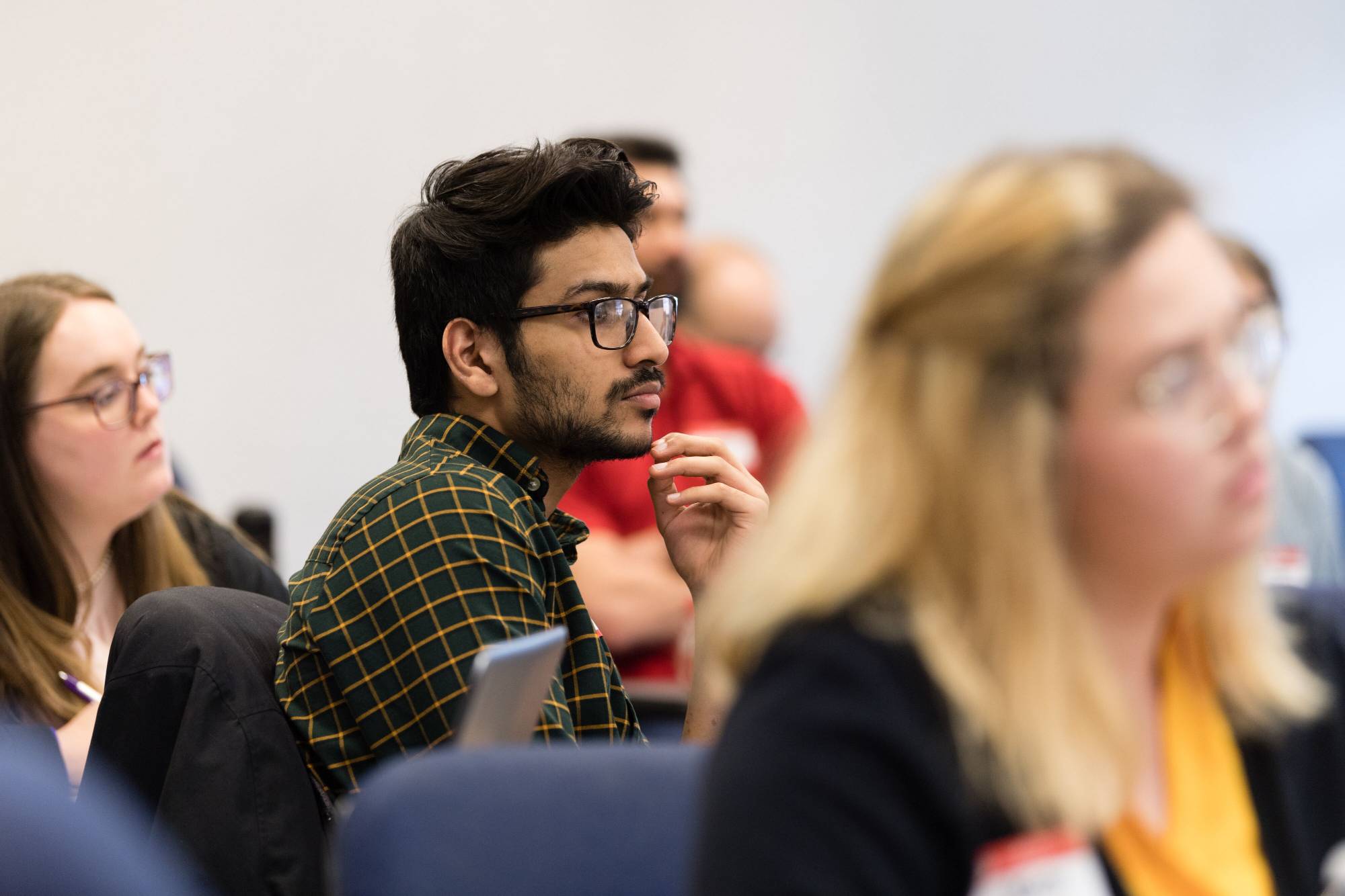 business students listening intently in a lecture