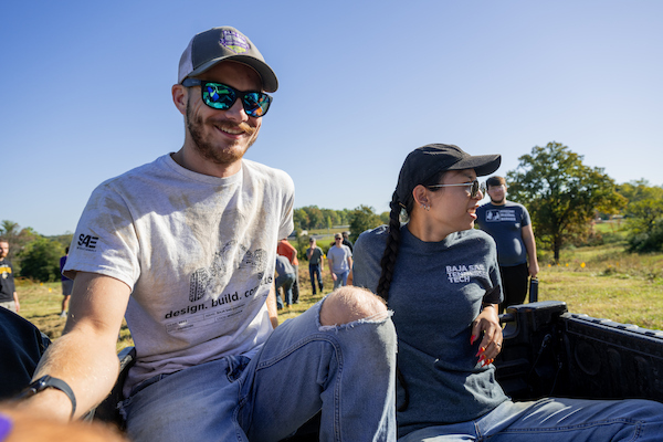 Students ride through the Tech Farm during a hands-on agriculture field learning experience.