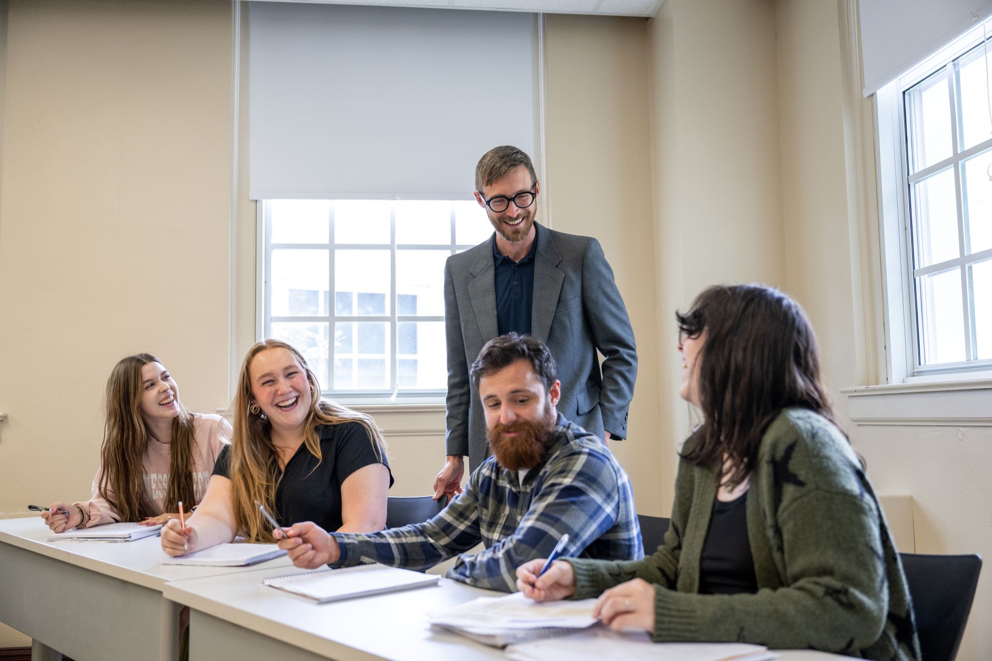 students learning from a professor