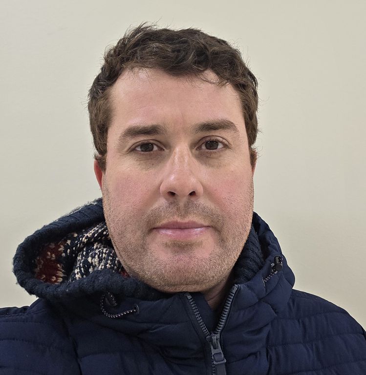 Shoulder-up photograph of Dr. Smain Sekal