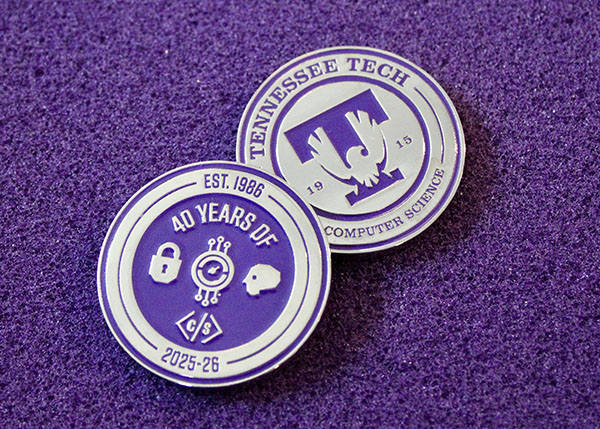 Two examples of Computer Science department coins