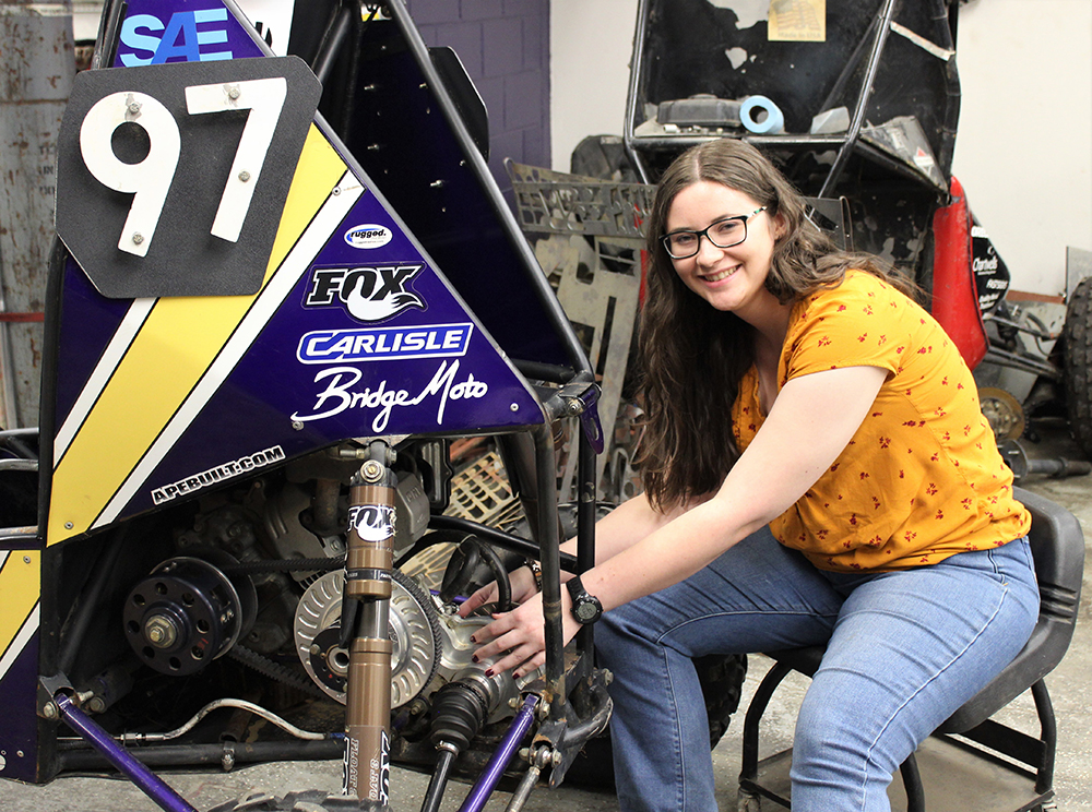  Student working on Baja SAE car