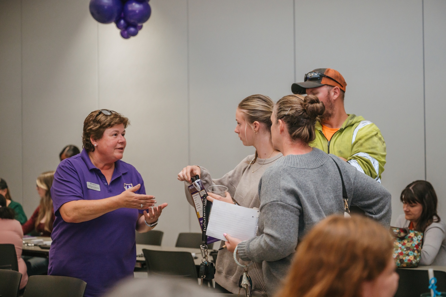 Staff Helping Family