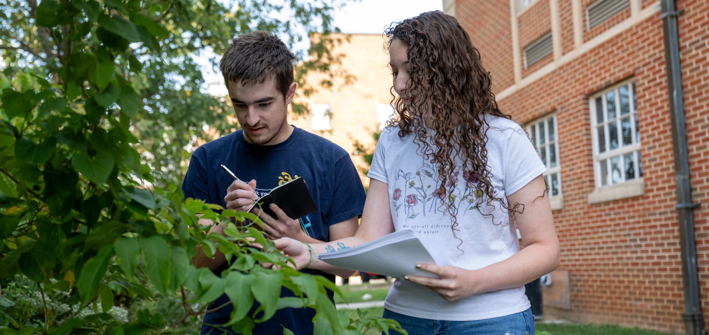Students taking notes 