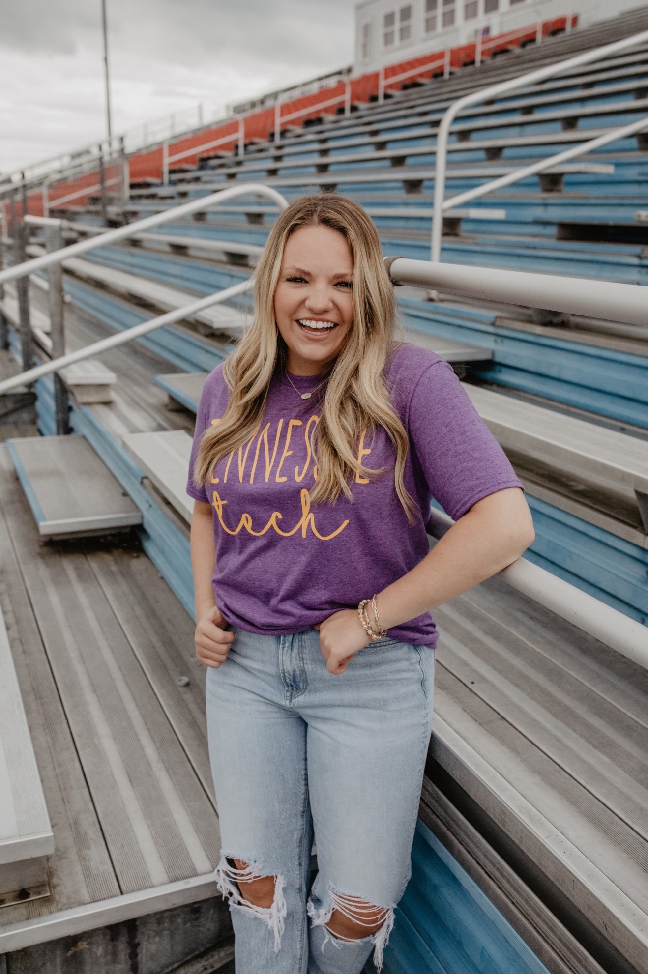 Student Worker in bleachers