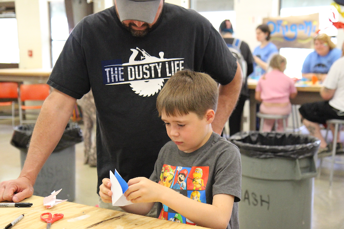 boy and father crafting