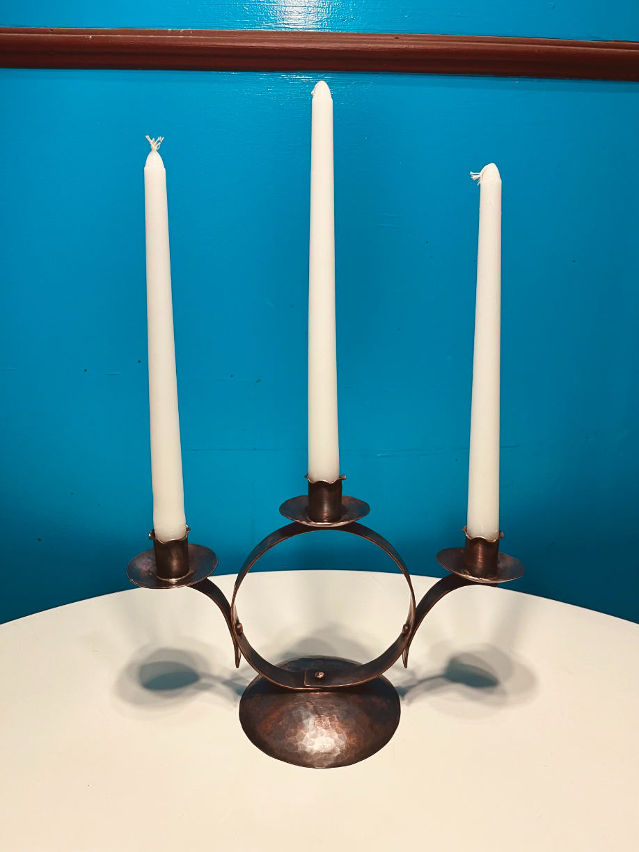 A three stem candleholder