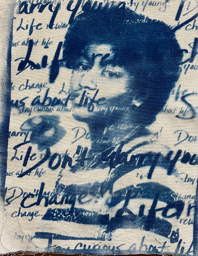 Cyanotype painting with woman and blue words written everywhere