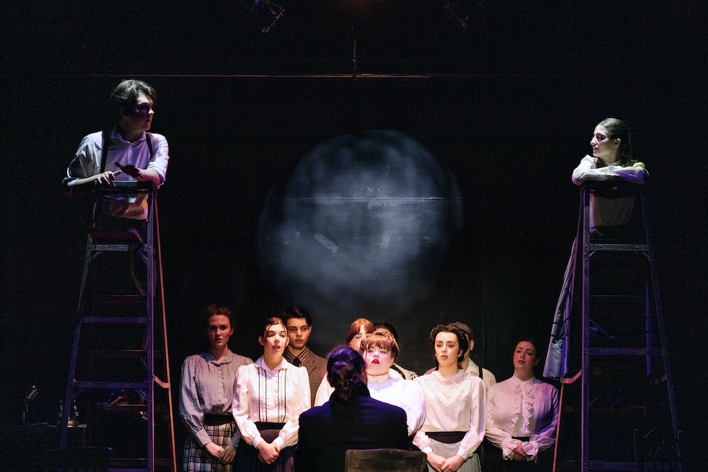 Choir and cast of Our Town by Thornton Wilder on stage at the backdoor playhouse 