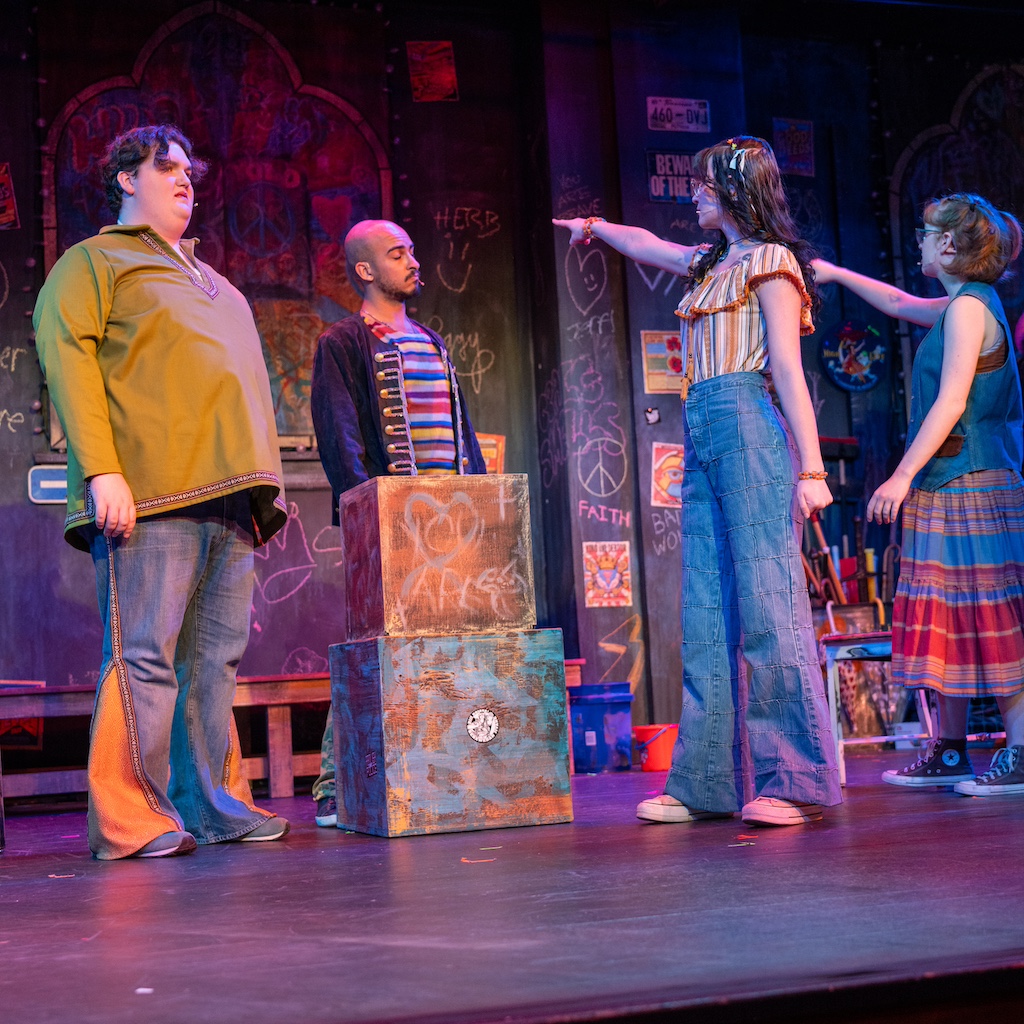 Godspell Godspell, John the Baptist being accused by Gilmer and Peggy while Jeffrey looks on