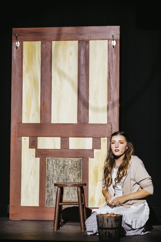 Into the Woods: Cinderella sitting on the floor