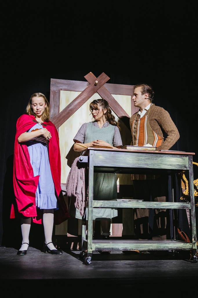 Into The Woods: Little red ridinghood, Baker and Baker's Wife in their cottage 