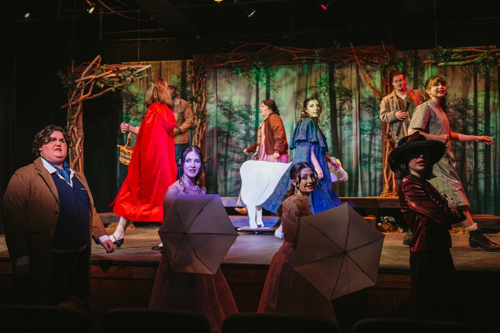 Into The Woods Into The Woods: many cast members, singing and dancing on stage