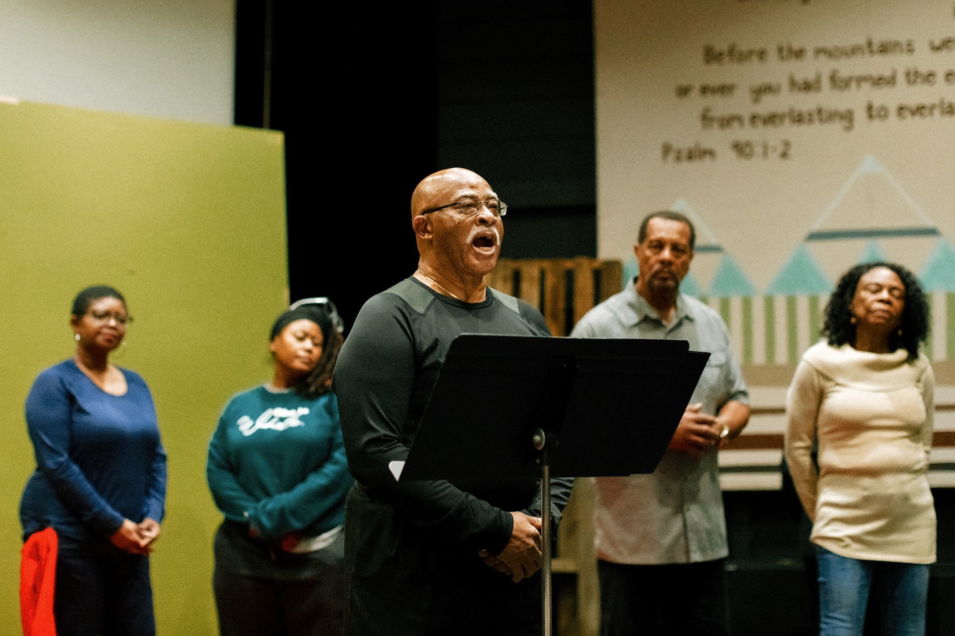 Tennessee Tech alumnus and Sports Hall of Fame member Morris Irby rehearses for his role in “I Am My Ancestors’ Wildest Dream” while cast members look on. Photo by Abby Weeden. 