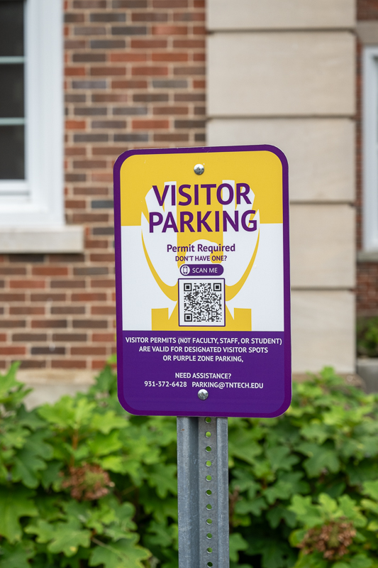 visitor parking sign