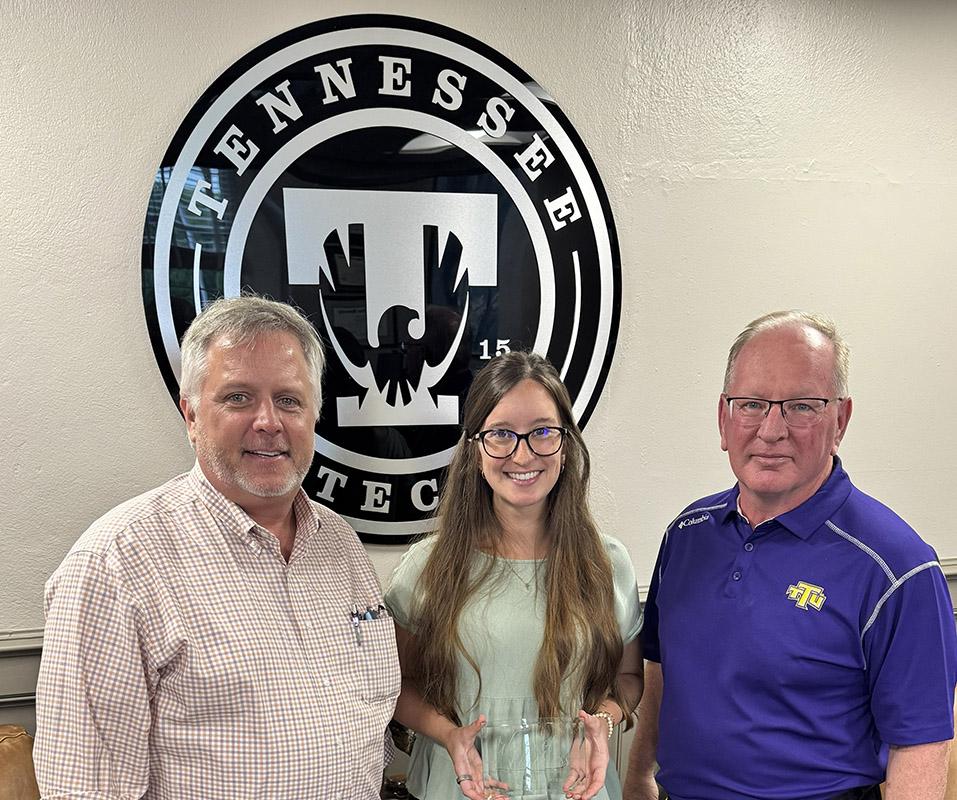 Shown left to right is Dr. Sean Alley, Allyson Farris and Provost Latour.