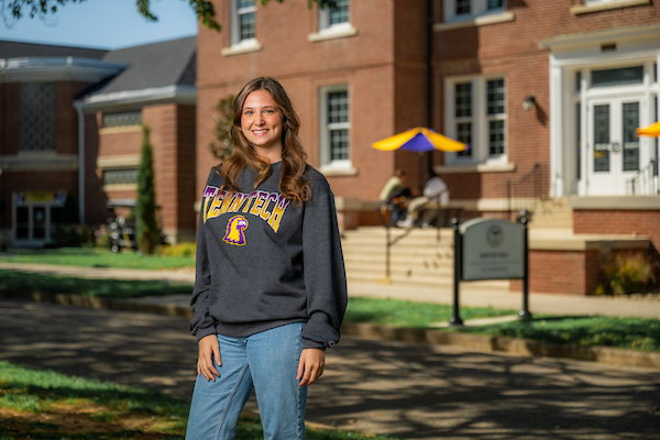 Ava Rogers in front of Bartoo Hall.