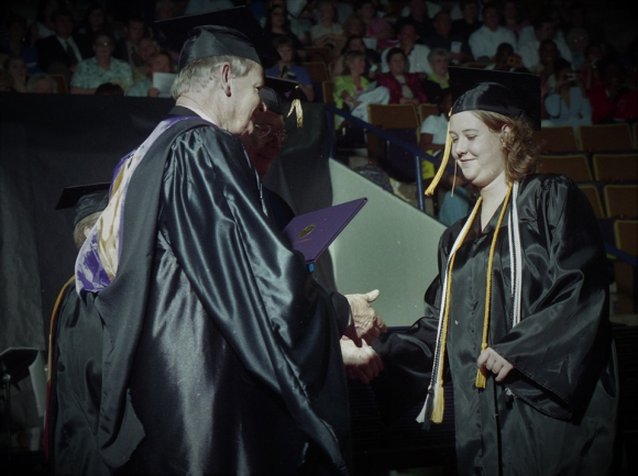 Jennifer Winningham Owens receives diploma from her father