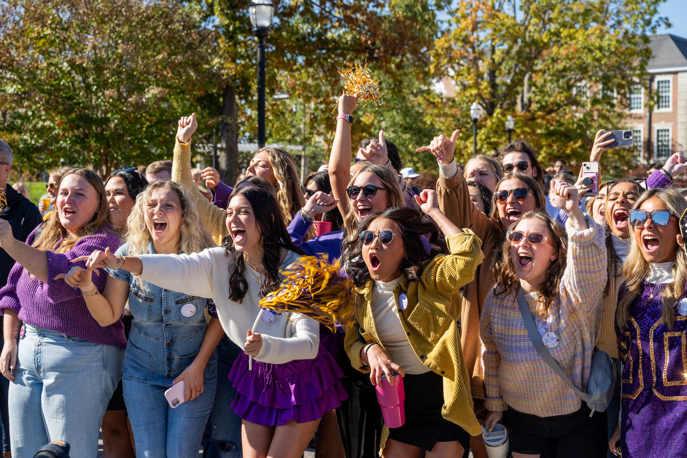 A group of students cheer