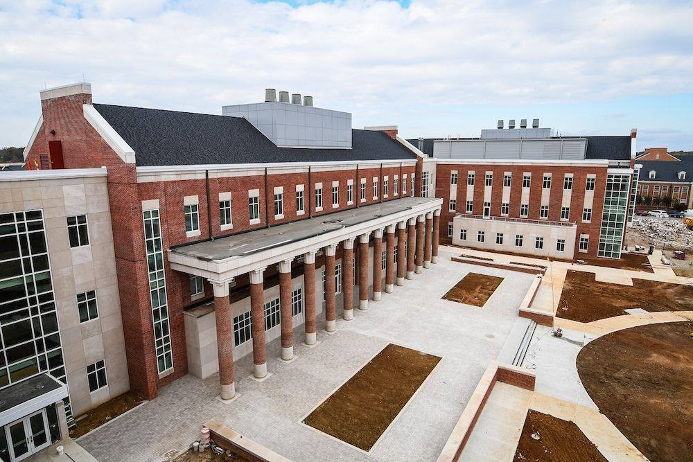 a drone photo of the courtyard and facade of the lab sciences building