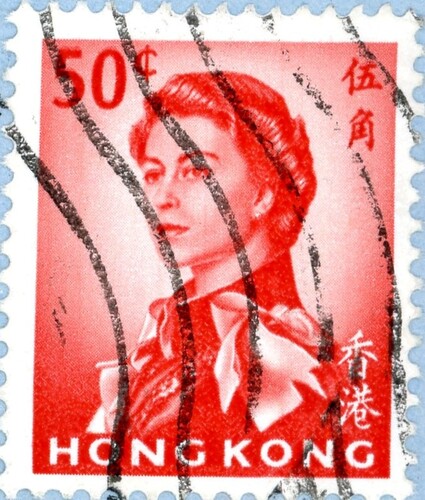 A monotone red 50 cent stamp from Hong Kong featuring Queen Elizabeth II