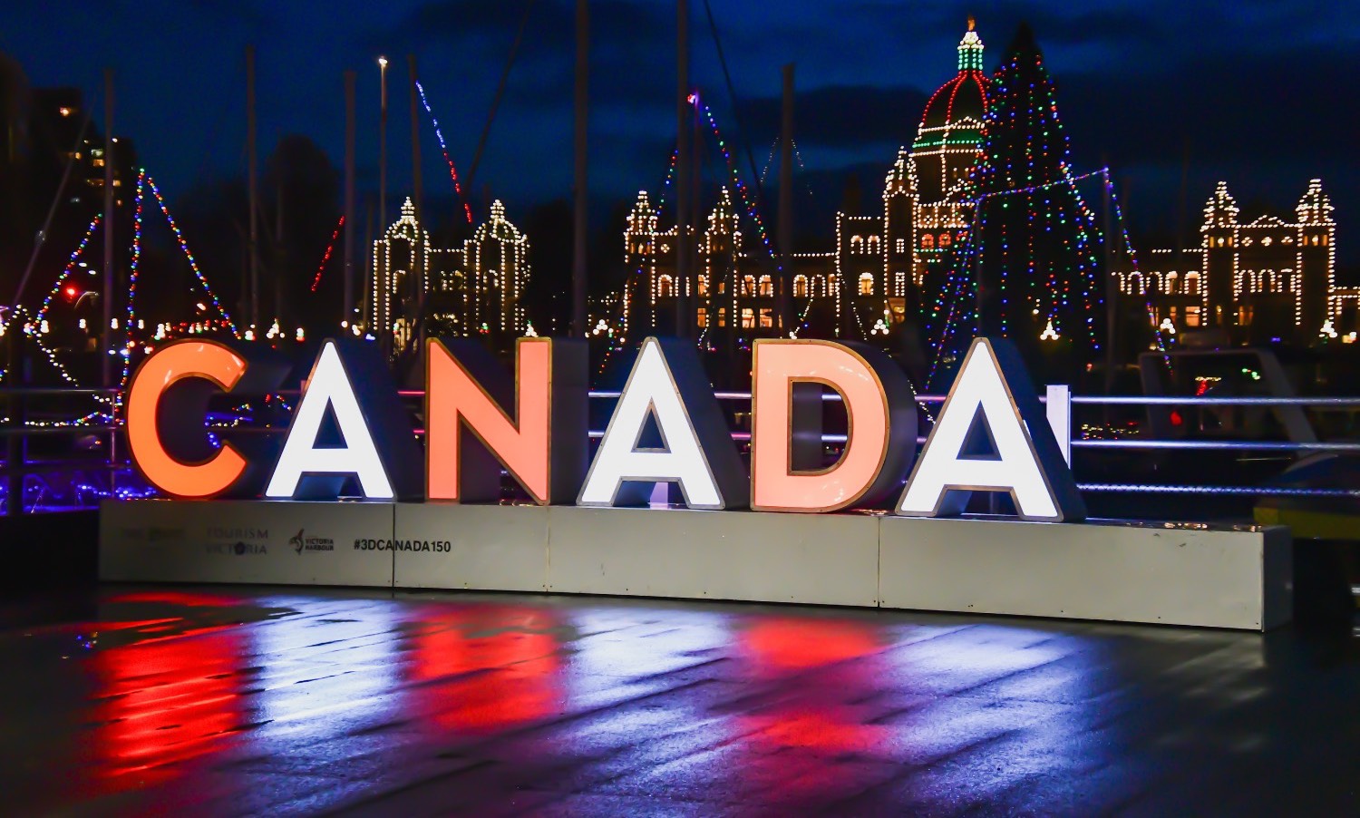 "Canada" sign light up at night