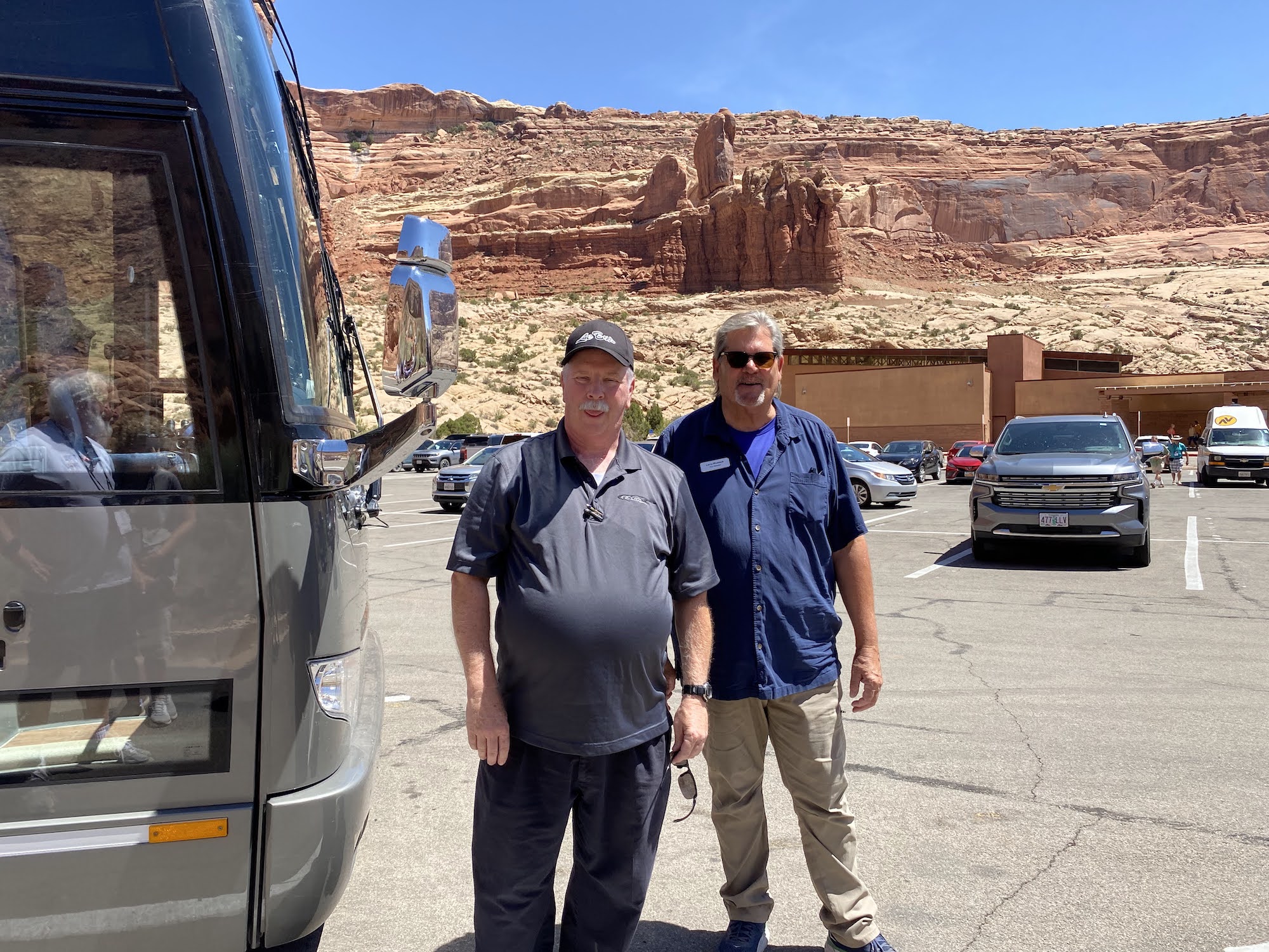 Our motocoach driver and tour guide beside the motor coach